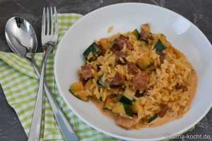 Reispfanne mit Zucchini und Speck
