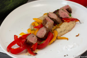 Lamm auf Zucchini-Bohnencreme